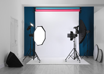 Photo studio interior with set of professional equipment