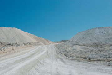 Open chalk mining quarry in sunny day