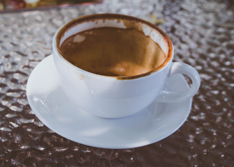 Dirty white mug of coffee