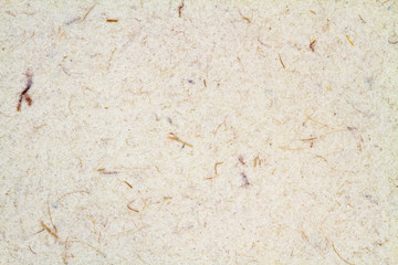 Light yellow or white villus or fiber paper. Closeup