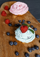 Cake, muffin, celebrate muffin with cream and decoration