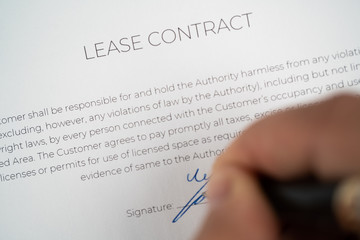 signing a lease contract close up