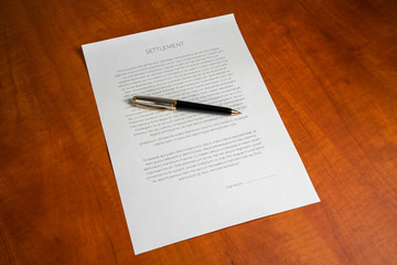 Settlement with a pen