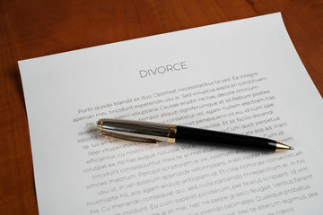 Divorce papers with a pen