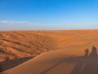 Fototapeta na wymiar Sunset at the Wahiba Sands (Rimal Al Wahiba, Ramlat al Wahiba, Wahiba Sands, Scharqiyya Sands) Sultanate of Oman