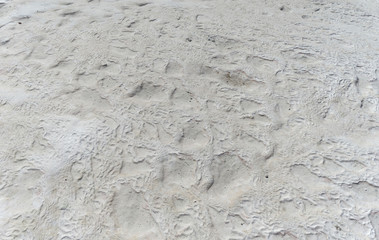 Snow-white salt deposits on the stone slopes created natural patterns.