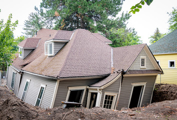 Home disaster when a house fell in a hole from basement being dug