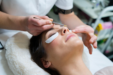 young woman with eyes closed during therapy