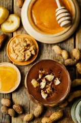 peanut butter smoothie with milk, chocolate, apples, banana and oats