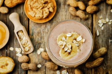 peanut butter smoothie with milk, chocolate, apples, banana and oats