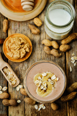 peanut butter smoothie with milk, chocolate, apples, banana and oats