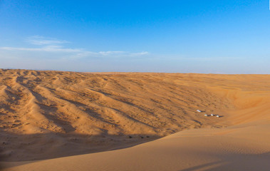 Fototapeta na wymiar SUV tour on Sunset at the Wahiba Sands (Rimal Al Wahiba, Ramlat al Wahiba, Wahiba Sands, Scharqiyya Sands) Sultanate of Oman