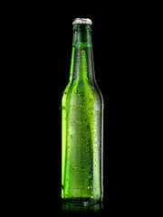 Green beer bottle with drops