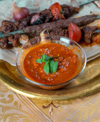 Arabic Barbecue food with fresh tomato sauce and garlic 