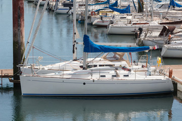 Fototapeta premium Sailboat moored at the pontoon in Moulin Blanc Harbor in Brest