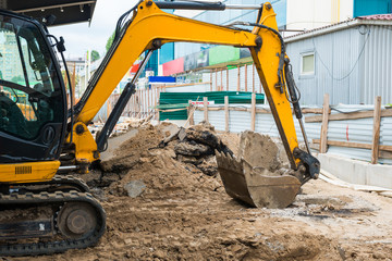 Bulldozer at construction site area building a road