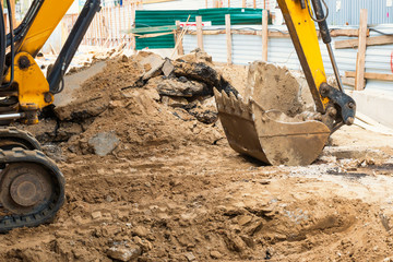 Bulldozer at construction site area building a road