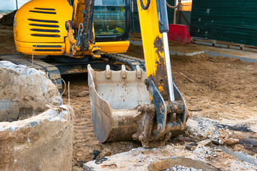 Excavator bucket or scoop at construction site, macro shot © Pavlo Vakhrushev