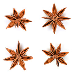 Star anise. Set of four star anise fruits. Closeup Isolated on white background with shadow, top view of chinese badiane spice or Illicium verum.