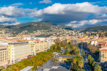 Fototapeta premium Nice, aerial view of the bay, the old town, on the French Riviera, with the mountains in background
