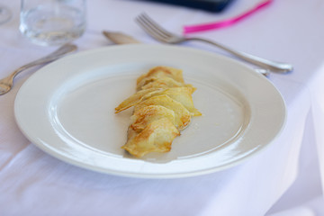 Elegant restaurant serving hot potato with cream specialty