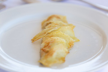 Elegant restaurant serving hot potato with cream specialty