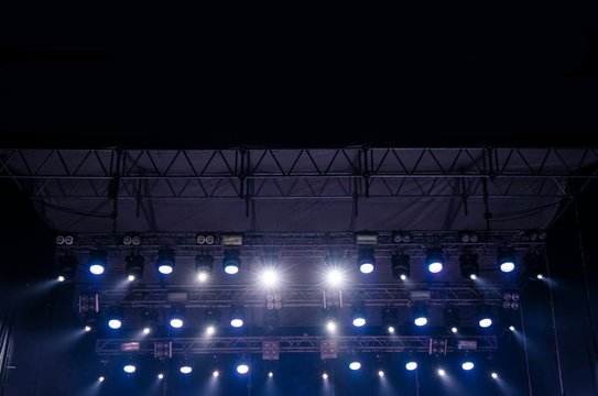 Symmetry Stage Construction With Projectors Illumination Blue Rays Of Light From Above