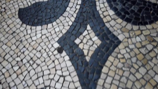 Portuguese sidewalk, pattern in a sidewalk in Lisbon