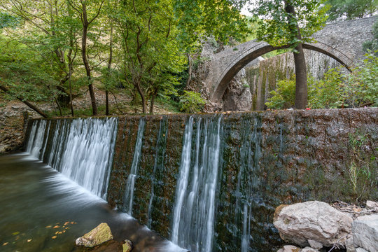 The stone bridge and waterfall of Palaiokaria near Trikala, Greece