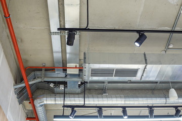 Industrial utilities under the ceiling. Ventilation, air conditioning, lighting and fire fighting.