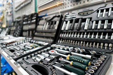 Opened boxes with car repair tools. Repair faults on road and in workshop.