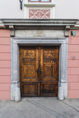 Old historical wooden door on a historical building in Skofja Loka, Slovenia. 