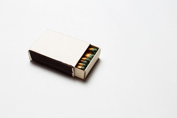 Close-up of opened matchbox with mockup.