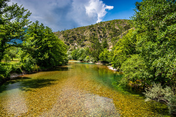 Fototapeta na wymiar Crystal clear water in river Neretva, Bosnia and Herzegovina