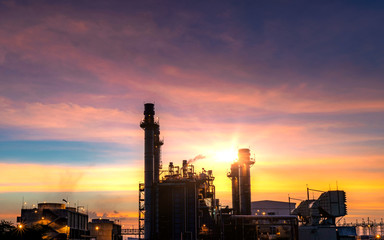 Power plant zone generating electricity at sunset- images