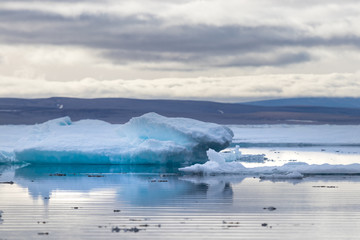 Glacier lagoon and icebergs on Peel Sound, a waterway situated in Pince of Wales island at the Northwest Passage in Canada.