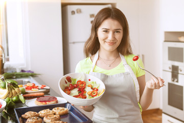 young woman at the kitchen