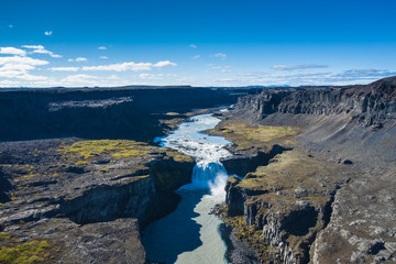 Fantastic view of canyon and waterfall Hafragilsfoss. Location: Vatnajokull National Park, river Jokulsa a Fjollum, Northeast Iceland