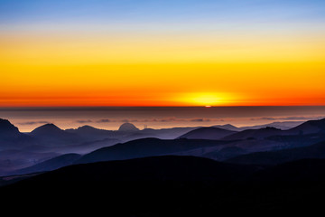 Setting Sun over Ocean, Hills