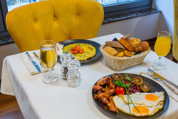 Breakfast served on hotel restaurant table