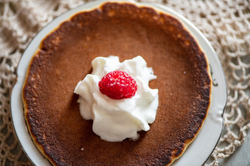 chocolate cake with whipped cream and strawberries