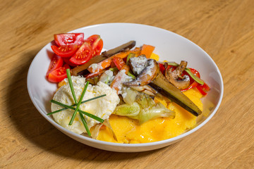 Polenta with cream cheese and vegetables