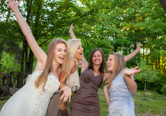 happy young and attractive girlfriends