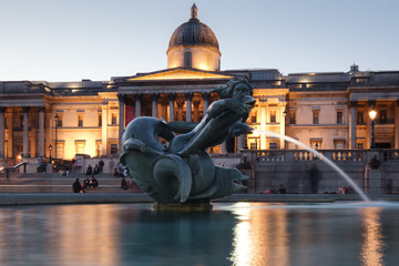 Trafalgar Square and the National Gallery in London illuminated at night