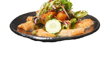 Spicy sashimi salmon salad with vegetables Japanese food style isolate white background