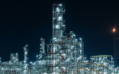 Industrial view oil and gas refinery,Detail of equipment oil pipeline steel at night background