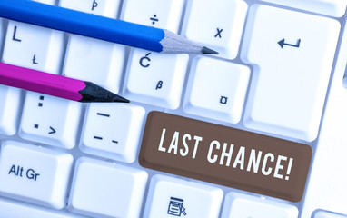 Conceptual hand writing showing Last Chance. Concept meaning final opportunity to achieve or acquire something you want White pc keyboard with note paper above the white background