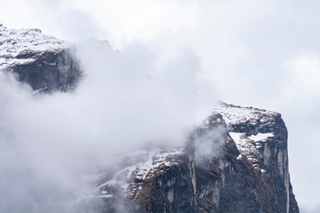 Mountain peak with snow, cloud and fog, Himalayas, Nepal