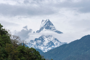 Mountain peak with snow, cloud and fog, Himalayas, Nepal