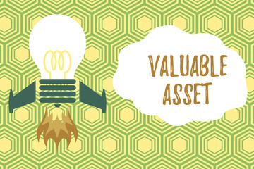 Handwriting text writing Valuable Asset. Conceptual photo Your most valuable asset is your ability or capacity Top view launching bulb rocket fire base. Starting new project. Fuel idea